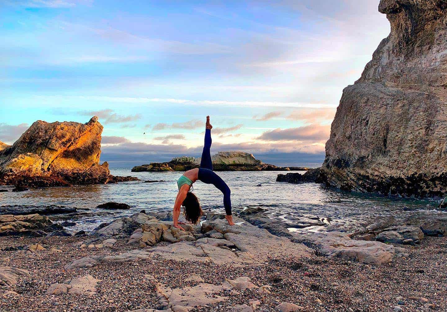 Beach Yoga photo credit @ellayoga Instagram
